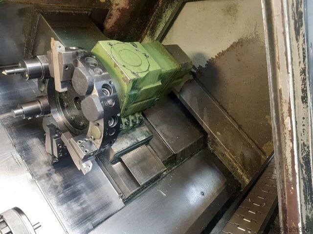 CNC lathe with bar loader TRAUB TND 200