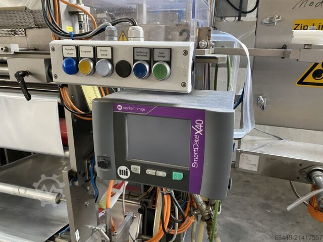 Filling, weighing and packaging line Ishida-Rovema-Paal Afvul– weeg- en verpakkingslijn