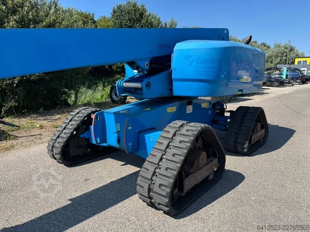 Telescopic boom lift Genie S 65 Trax