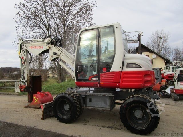 Mobile excavator Takeuchi TB 295W - POWERTILT + Schnellw + 3 Löffel