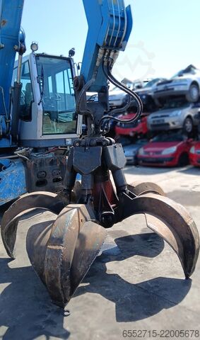 Wheel loader with grapple Terex Fuchs MHL 320