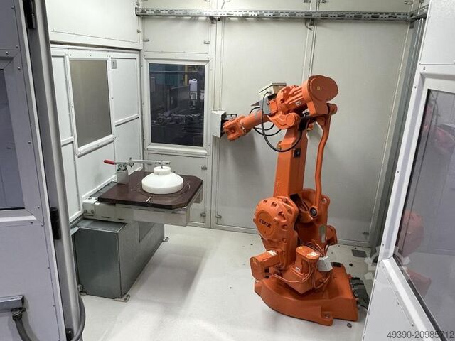 Flexible milling cell with 6-axis ABB industrial robot; robotic milling system with 2 workstations,  ABB - CARAT IRC5 / IRB 2400/16 M2004