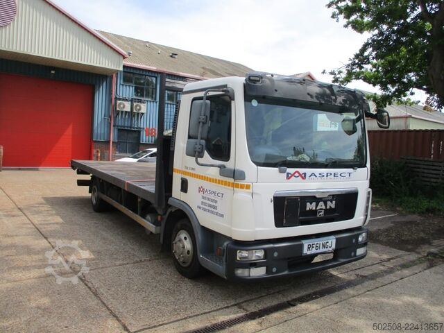 Flatbed truck MAN TGL 7.180