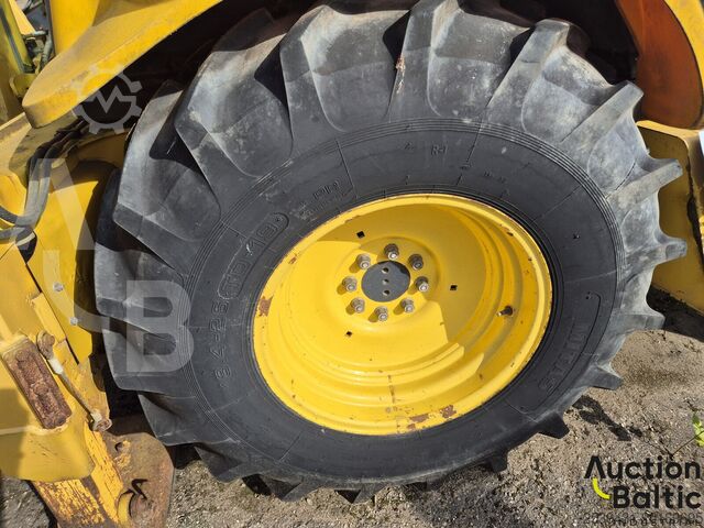 Wheel excavator New Holland LB 110-4 PT