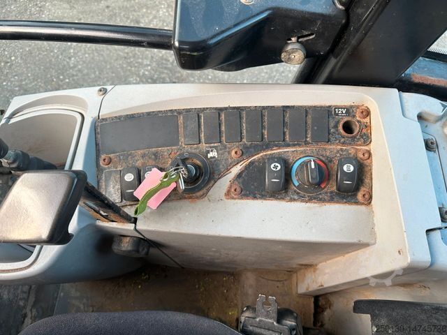 Wheel loader CATERPILLAR 906 H mit Schaufel & Palettengabel