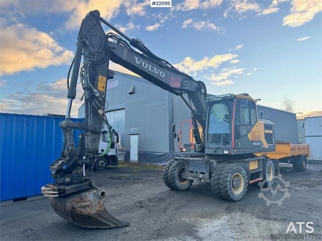 Radbagger Volvo EW160E wheeled excavator with rototilt and two buc
