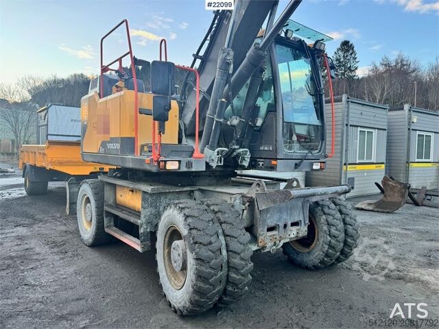 Radbagger Volvo EW160E wheeled excavator with rototilt and two buc