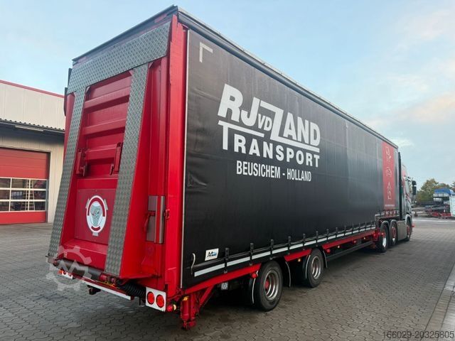 Low loader semitrailer MEUSBURGER 2-Achs-Gabelstaplertransporter Rampe Dhollandia