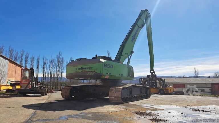 Umschlagbagger Sennebogen 850R with hydraulic rotating grapple