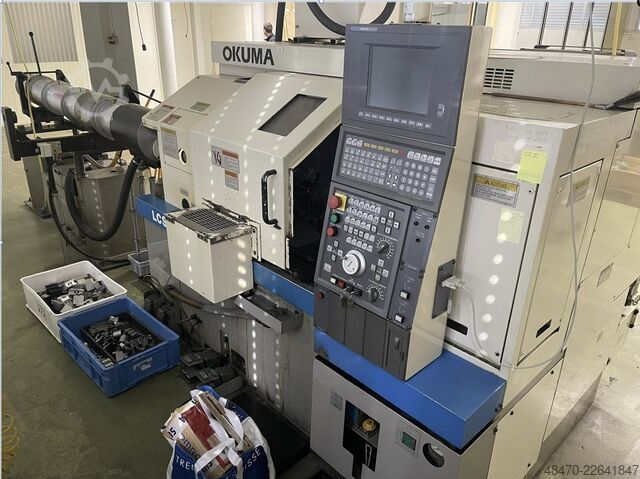 Cnc lathe with barfeeder Okuma LCS15