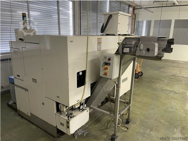 Cnc lathe with barfeeder Okuma LCS15