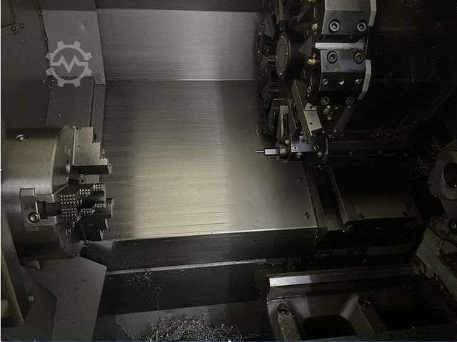 Cnc lathe with barfeeder Okuma LCS15