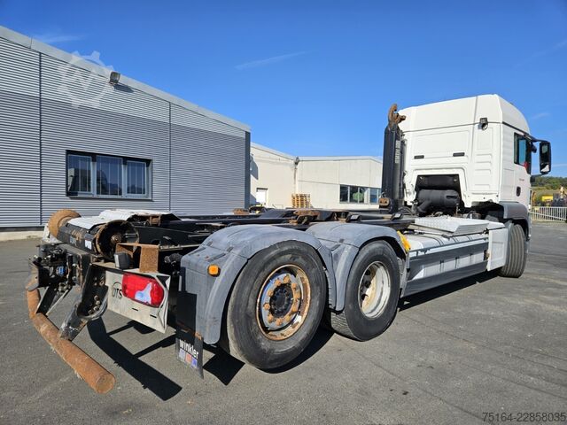 Roll-off tipper truck MAN TGS 26.440 6x2 BL mit Lenkachse