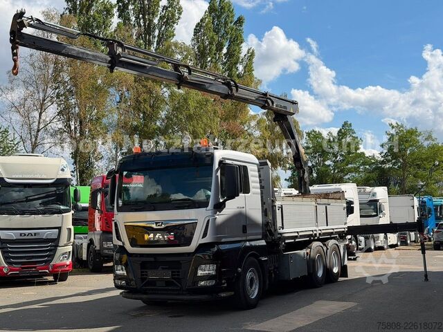 Kipper LKW MAN TGX 33.500 6x4 Kipper Kran PK19.001 Funk Greifer