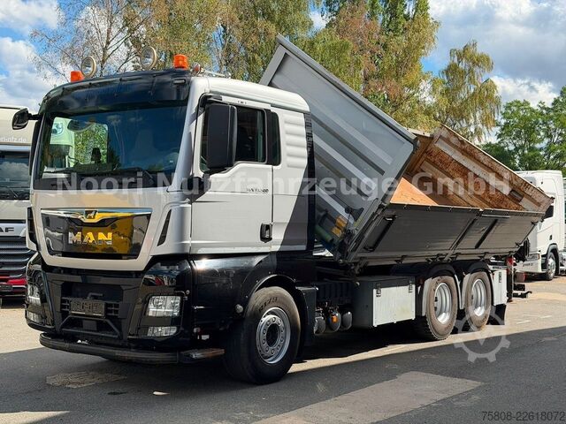 Kipper LKW MAN TGX 33.500 6x4 Kipper Kran PK19.001 Funk Greifer