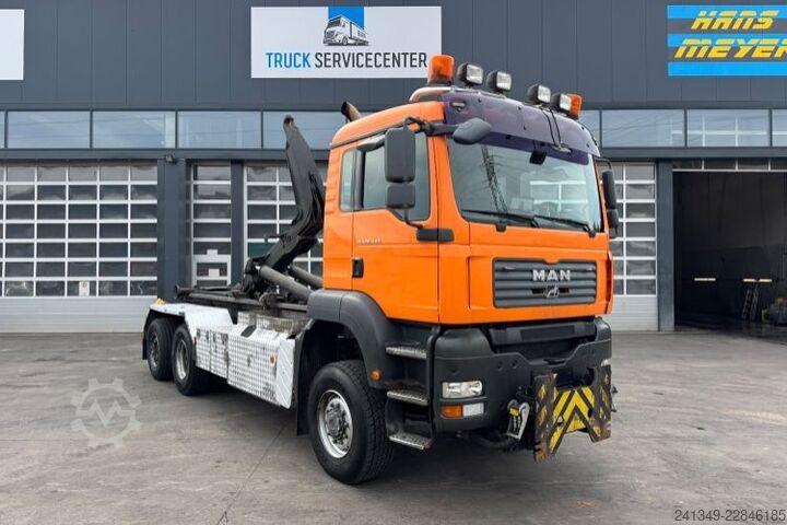 Roll-off tipper truck MAN TGA 28.440 6x4-4 Hiab 21T