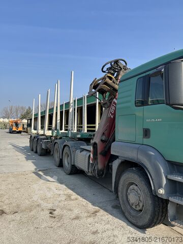 LOGS CARRYING MAN TRUCK MAN 