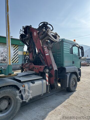 LOGS CARRYING MAN TRUCK MAN 