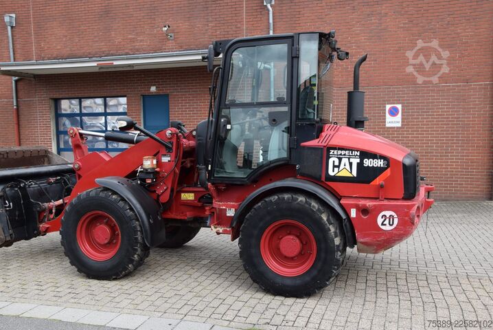 Wheel loader Caterpillar Radlader 908H2 Klappschaufel Gabel SWZSA