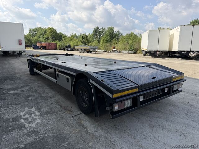 Low loader trailer Hüffermann ISA  2 Achs Abrollanhänger- Tieflader