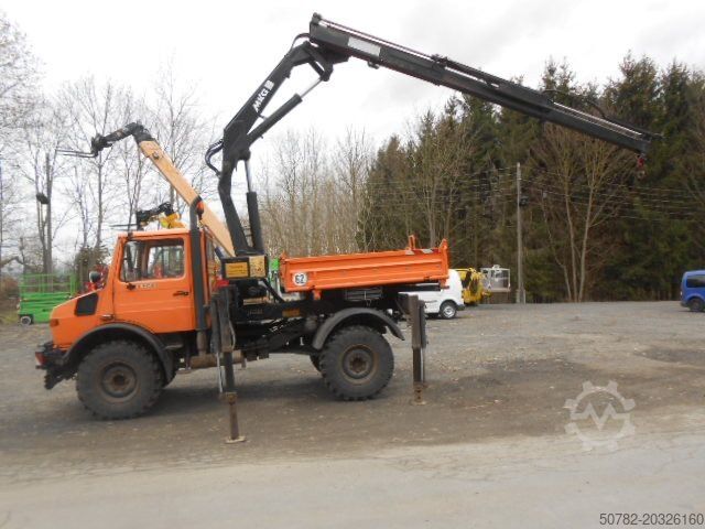 Tipper truck UNIMOG U1450 427/11 mit Kran