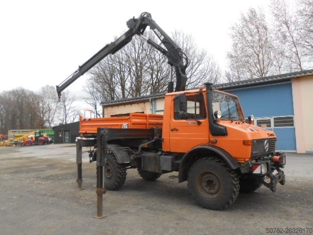 Tipper truck MERCEDES-BENZ U1450 427/11 mit Kran