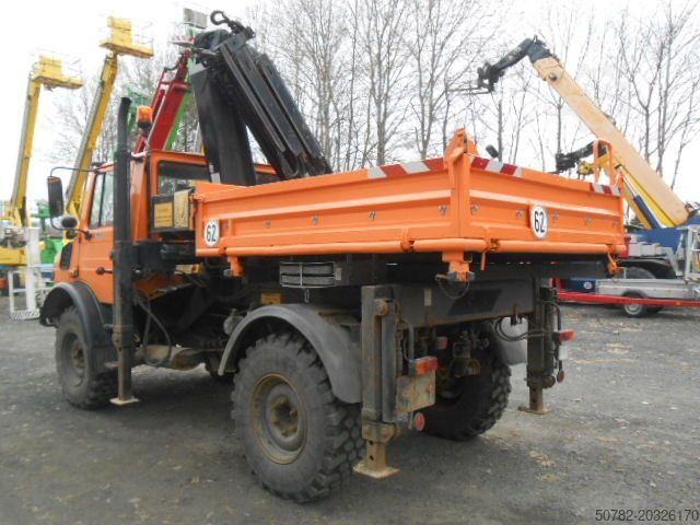 Tipper truck MERCEDES-BENZ U1450 427/11 mit Kran
