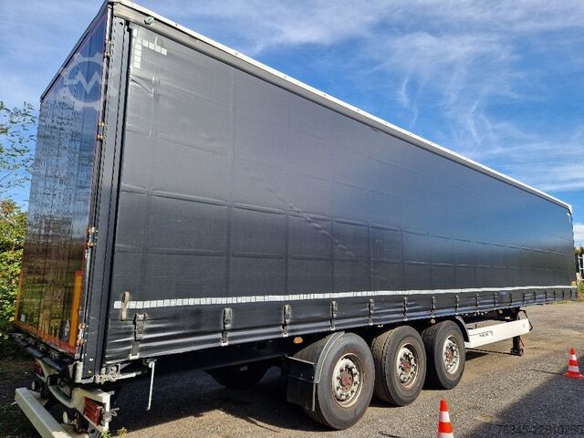 Auflieger mit Pritsche & Plane WIELTON Curtainsider NS-3 K schwarz, Edscha, Liftachse