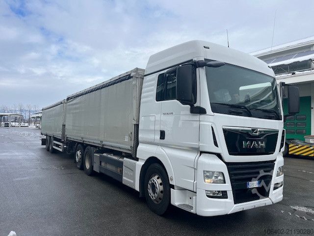 Kipper LKW MAN TGX 26.470 6x2-4 BL Zweiseitenkipper mit Hänger