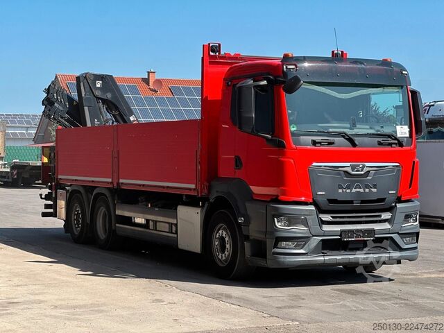 Flatbed truck MAN TGS 26.430 6x2LL Baustoffp./ HIAB 228 Lenk/Lift