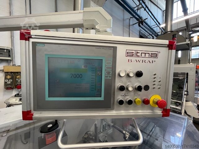 Macchina per cellophanatura riviste e li SITMA spa cellofanatrice per riviste e libri 1005