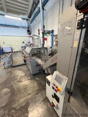 Macchina per cellophanatura riviste e li SITMA spa cellofanatrice per riviste e libri 1005