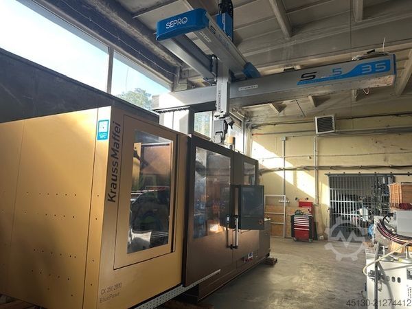 Injection molding machine KraussMaffei KM 250-2000 CX Blue Power