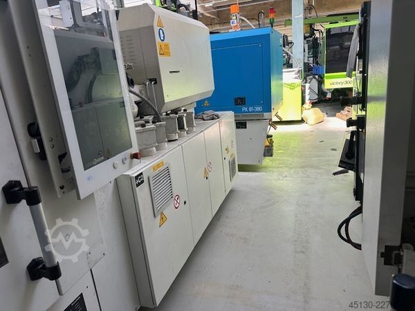 Injection molding machine KraussMaffei KM 121-380 PX