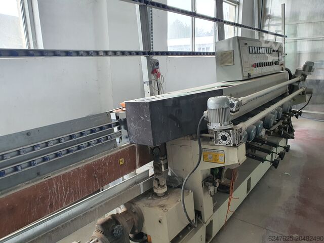Glass beveling and grinding machine
