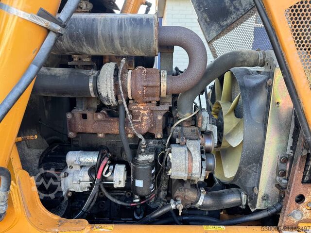 Backhoe loader CASE 590 SLE