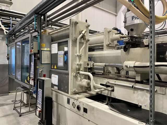 Plastic injection molding machine KraussMaffei 420-2700 C1