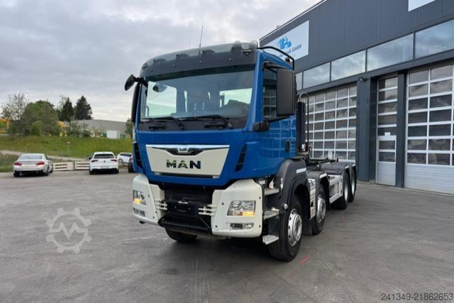 Roll-off tipper truck MAN TGS 35.480 8x4 Hiab 26T