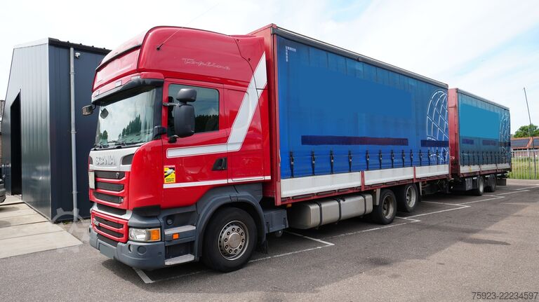 Sliding tarpaulin Scania R 400 6x2 curtainside in combo with Burg trailer