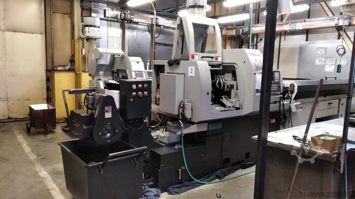 Turning automatic lathe HANWHA XP32S + dopravník třísek