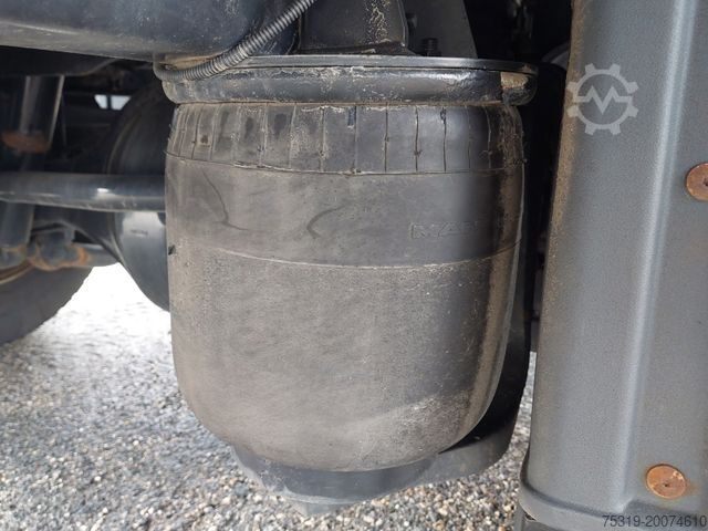 Flatbed truck with tarp MAN TGL 12.250 BL 4x2