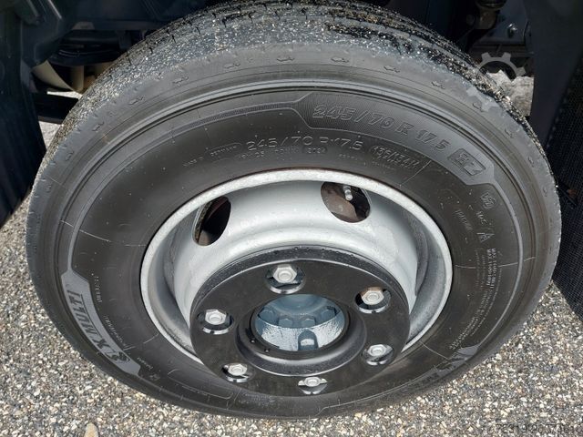 Flatbed truck with tarp MAN TGL 12.250 BL 4x2