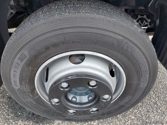 Flatbed truck with tarp MAN TGL 12.250 BL 4x2