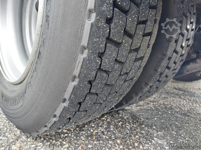 Flatbed truck with tarp MAN TGL 12.250 BL 4x2