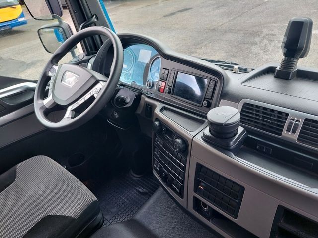 Flatbed truck with tarp MAN TGL 12.250 BL 4x2