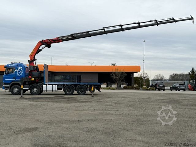 Flatbed truck SCANIA G450 8x4 Pritsche mit Kran Palfinger PK76002 EH