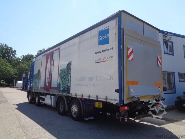 Flatbed truck with tarp SCANIA R410 8x2 Lift- + Lenkachse 9 Meter Pritsche