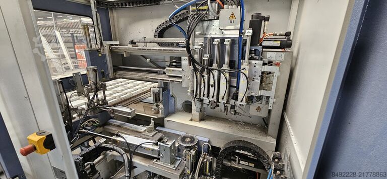 8-head welding line for PVC front doors Rotox und Hollinger Eckenputzautomat EPA + WTS