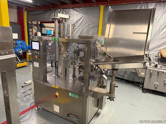Complete tube filling and sealing system Complete Axomatic Tube Filling and Sealing System