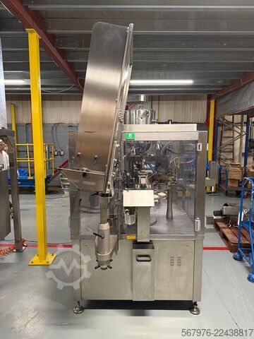 Complete tube filling and sealing system Complete Axomatic Tube Filling and Sealing System